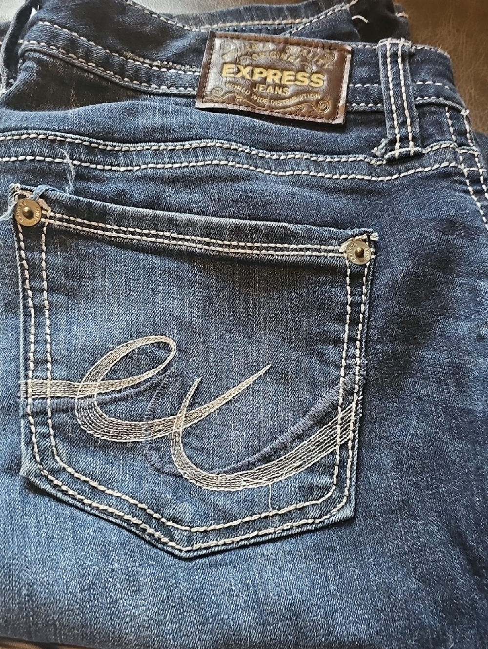 Express Women’s Dark Blue Embroidered Pocket Jeans